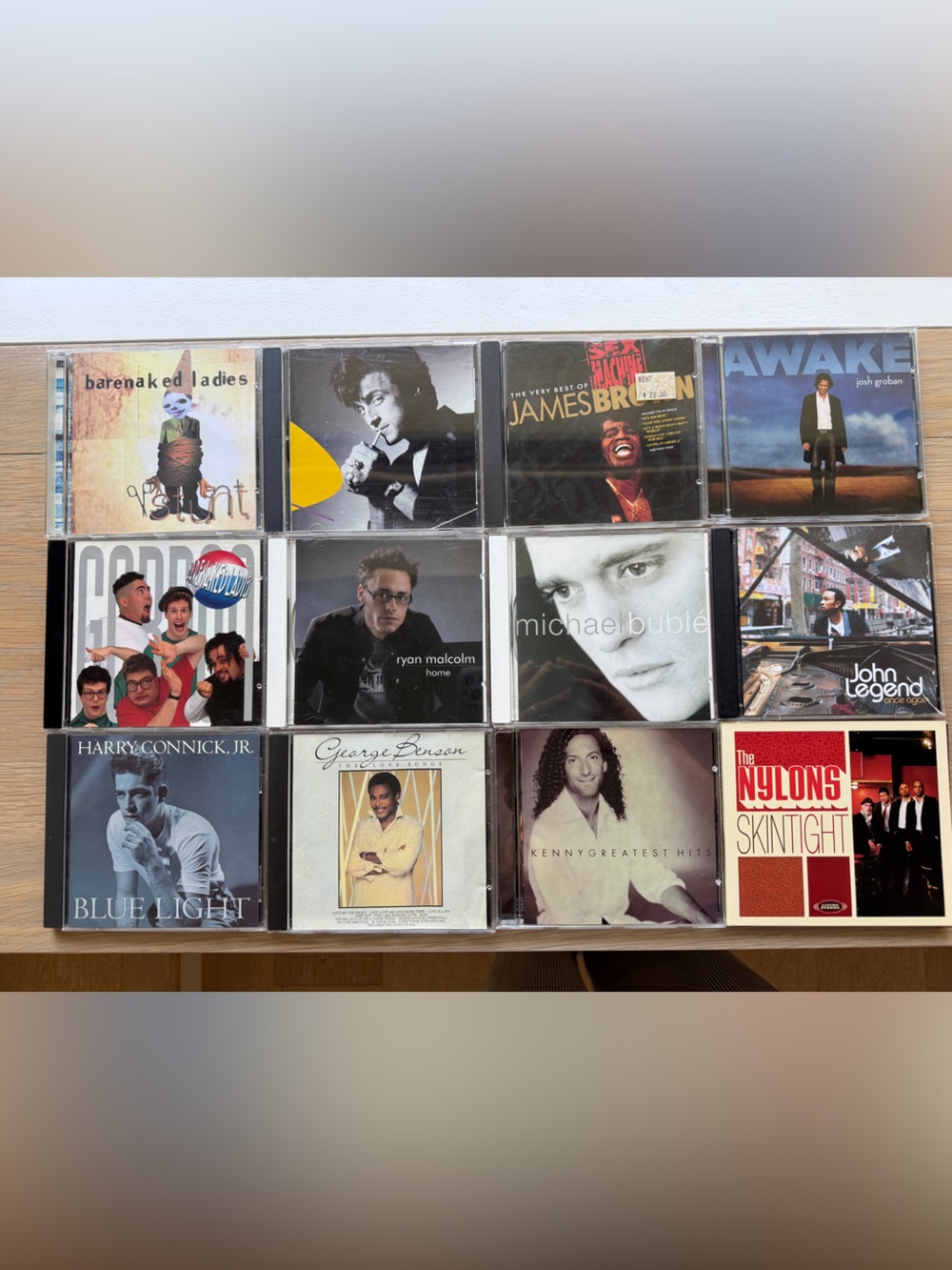 12 assorted music CD’s including James Brown and The Nylons
